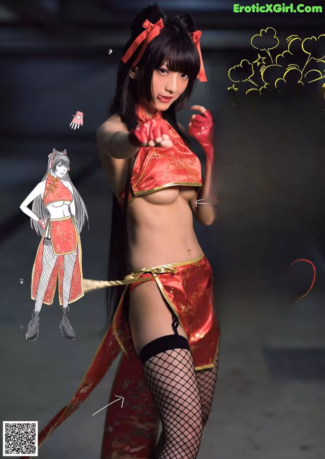 A woman in a red and black outfit is posing for a picture.